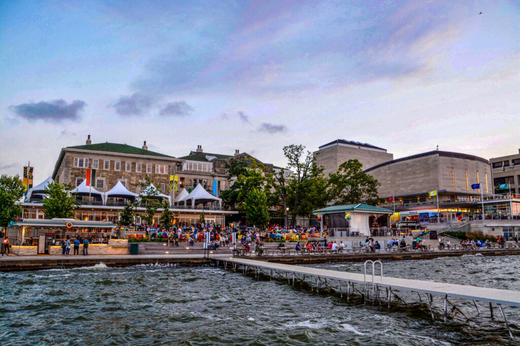 City pier with colorful lights and lots of businesses