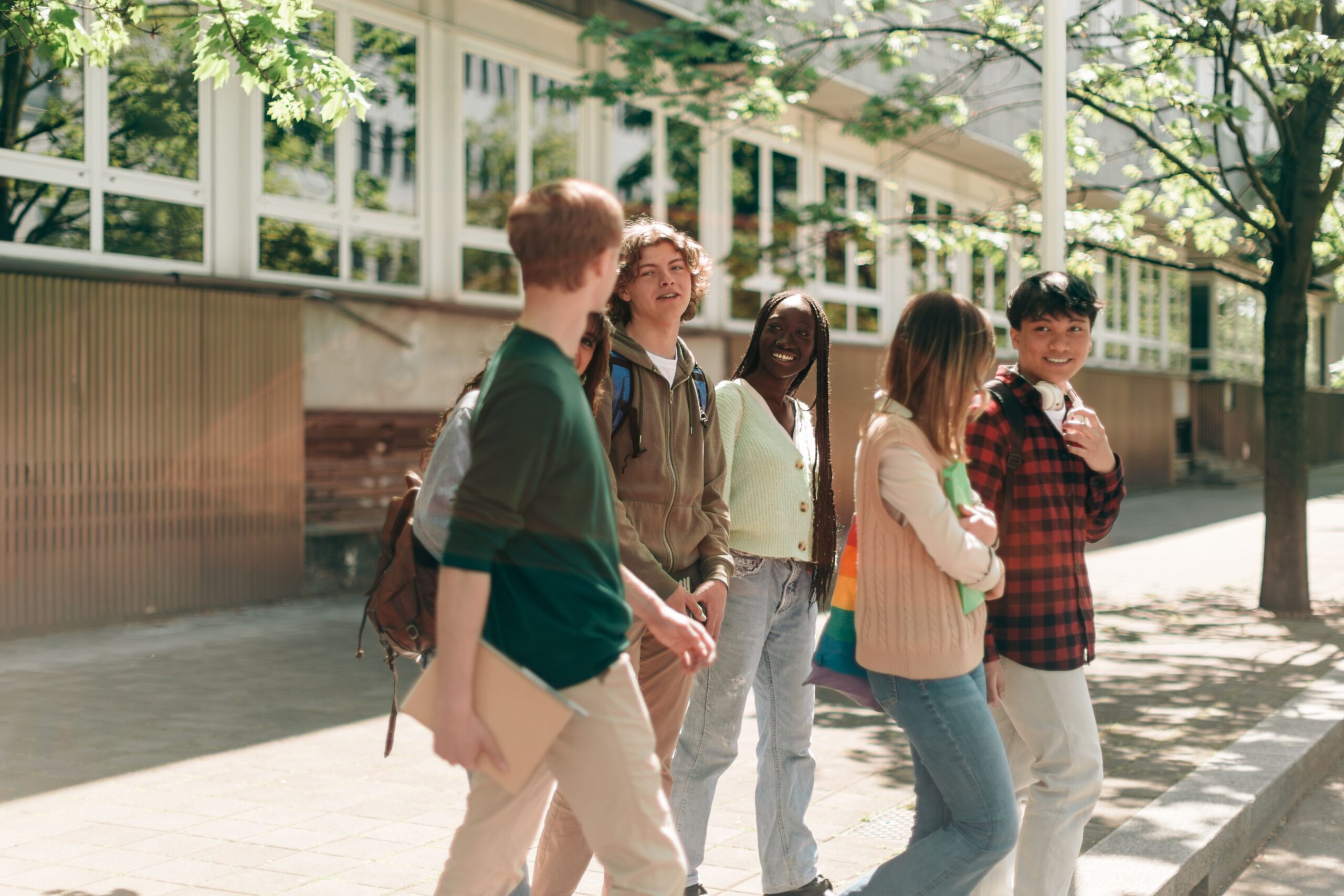 Students walking outside Axton Madison apartments near the UW-Madison campus